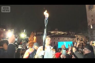 オリンピック開幕まで1週間　聖火がジャンプ競技の町に到着(2026年1月30日)